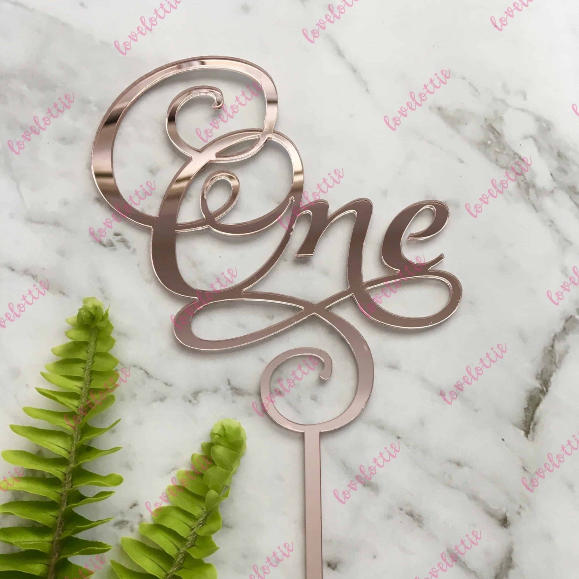 One Swirl Acrylic Rose Gold Mirror Cake Topper